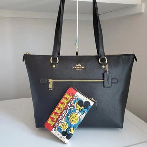 Coach shoulder bag and disney wallet set